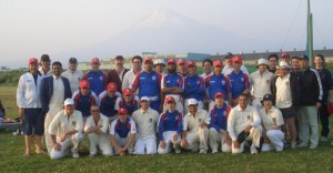   SCC & JCA Menâ€™s National Team after the first tour game with the picturesque Mt. Fuji in the background at the JCA National Academy Grounds 